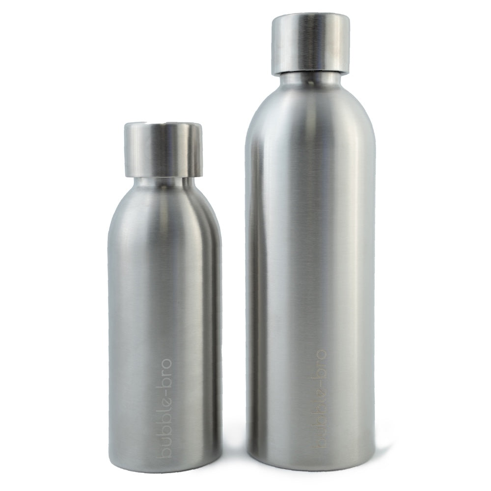 Two stainless steel water bottles with Christmas decorations on a white background