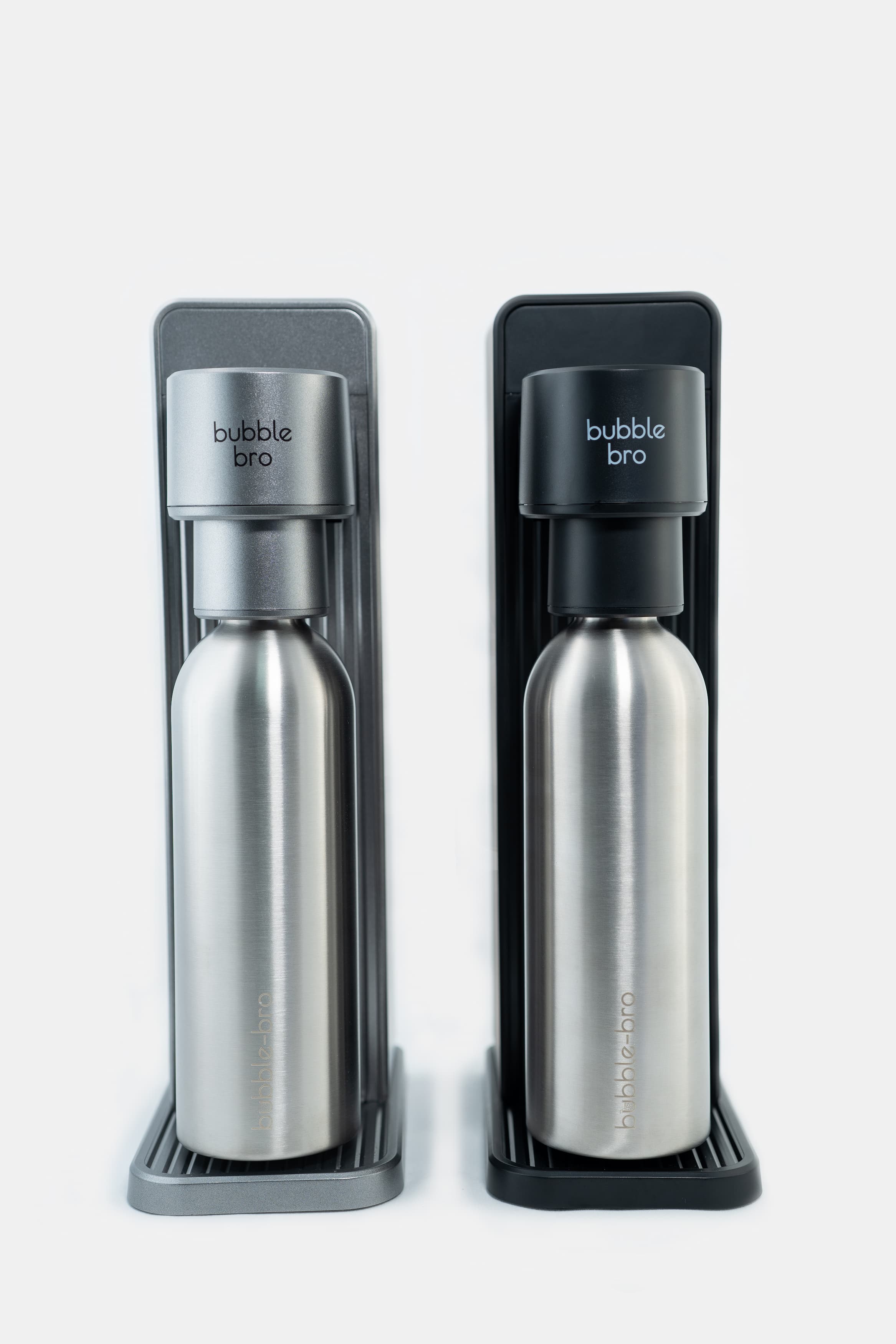 Bubble Bro stainless steel bottle in a black and gray Versa carbonating machine