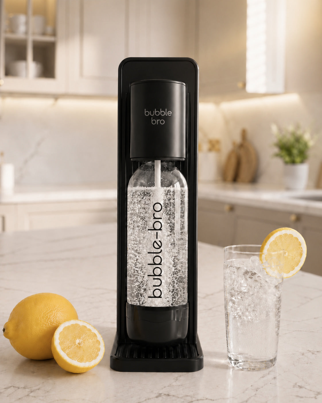 Bubblebro sparkling water maker in black on a kitchen counter with fresh lemons and a glass of fizzy water #color_black