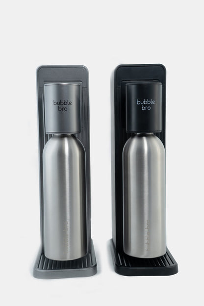 Bubble Bro stainless steel bottle in a black and gray Origin carbonating machine